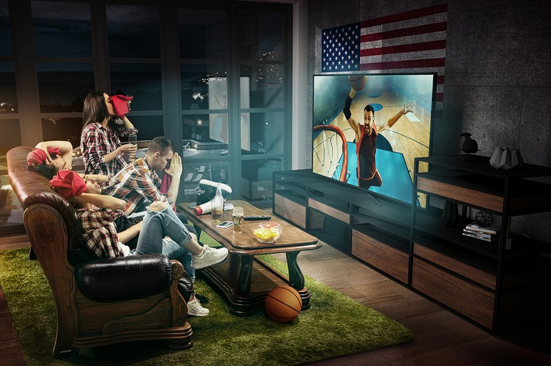 Friends Watching Basketball on Large TV