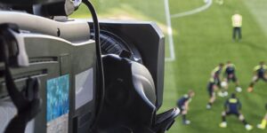TV Camera Filming Football Pitch