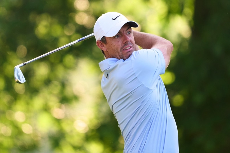 Rory McIllroy takes a swing
