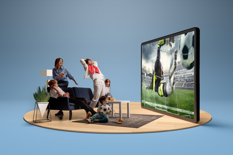 Family watching football on TV
