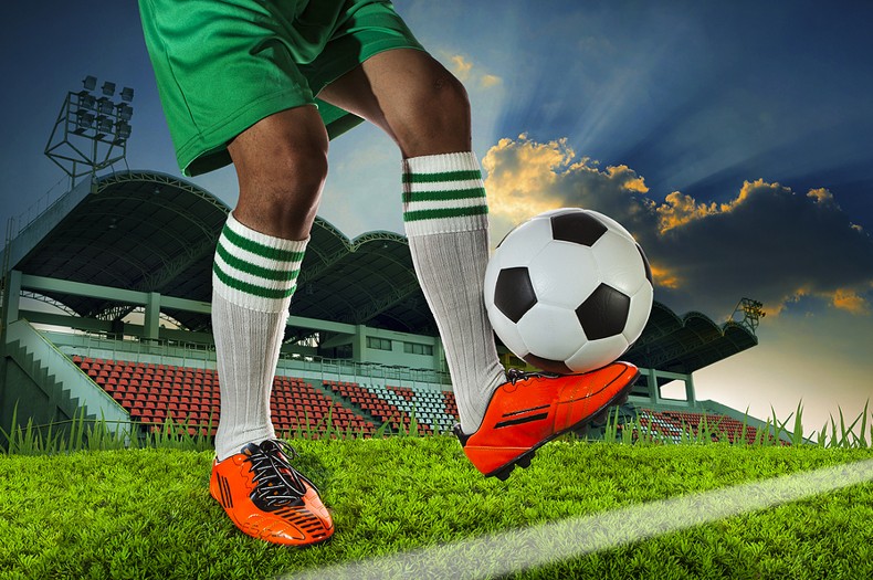 Football player and ball