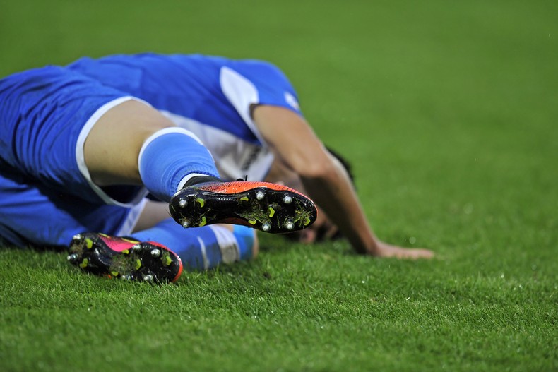 Injured Footballer on Ground