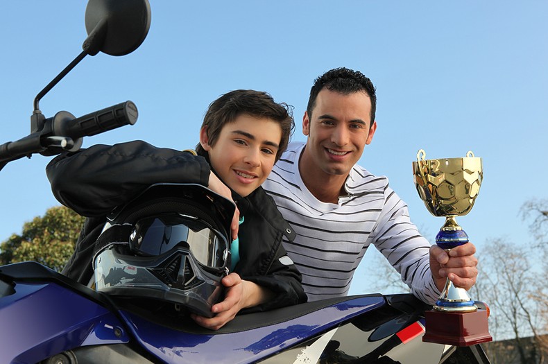 Motorcycle Coach and Young Rider