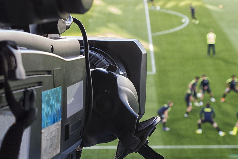 TV Camera Filming Football Pitch