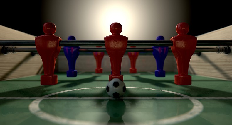 Three Red Table Soccer Players