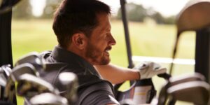 Golf buggy man driving